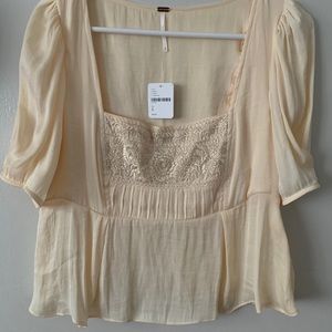 Free people cream colored blouse